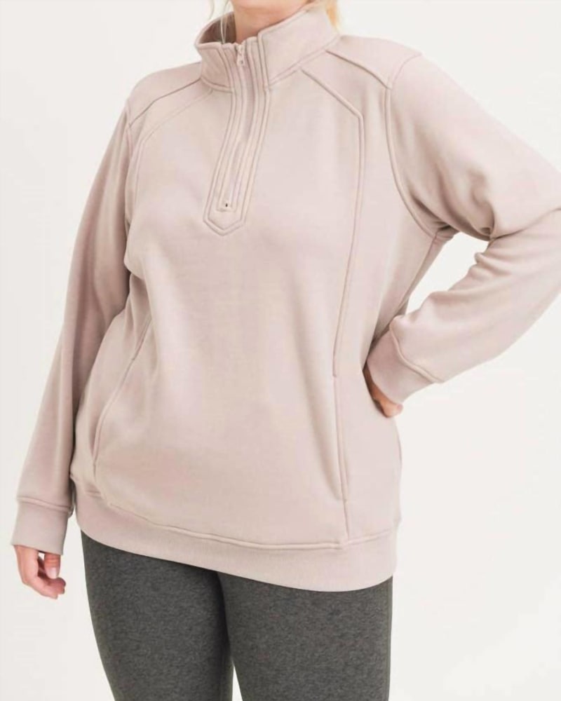 Side of a model wearing a size 3X Curvy Double Raglan Half-Zip Jacket in Taupe in Taupe by mono b. | dia_product_style_image_id:326098